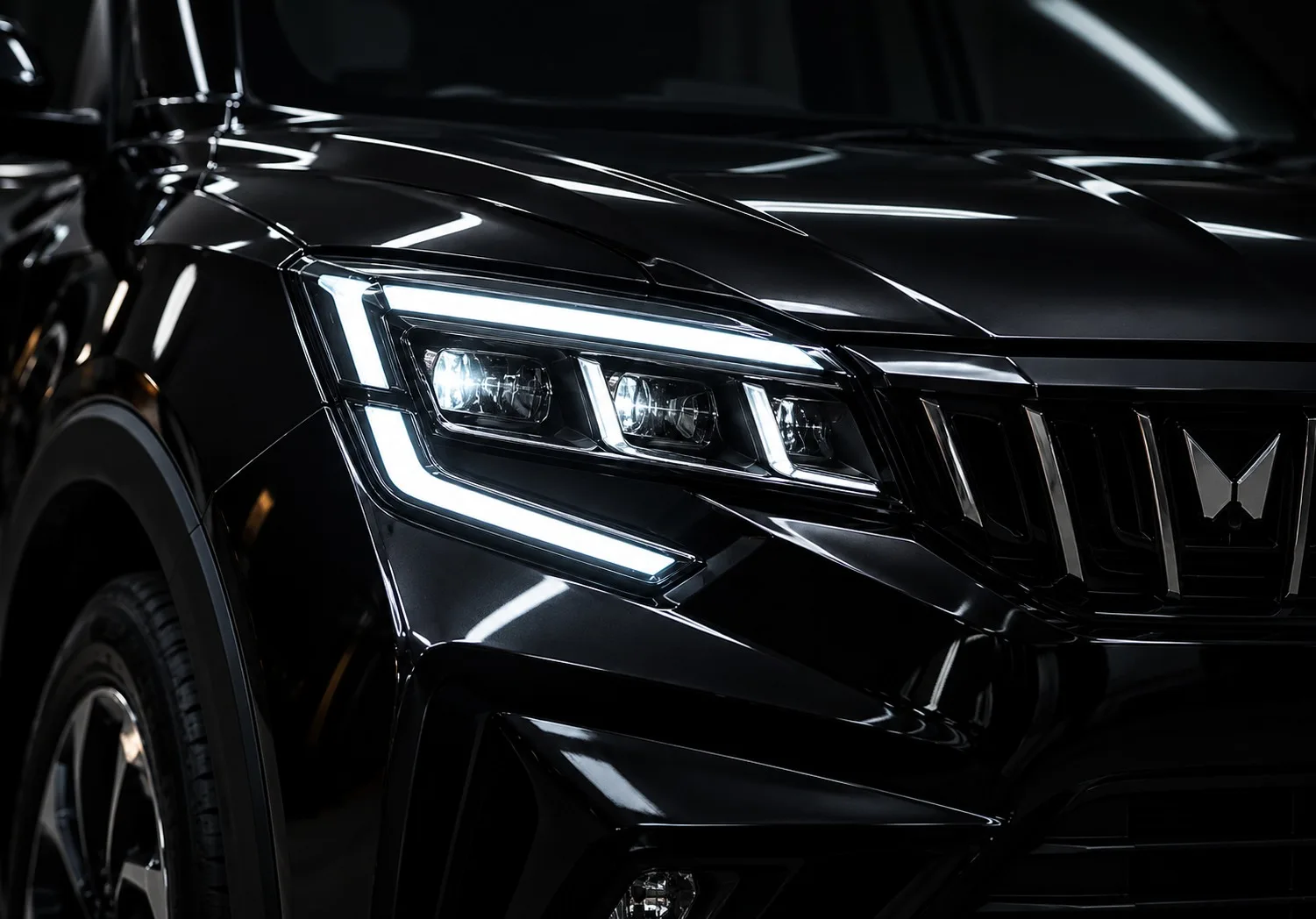 Close-up of a new car headlight and paint finish